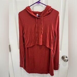 Latched mama every day hoodie in a burnt red color.